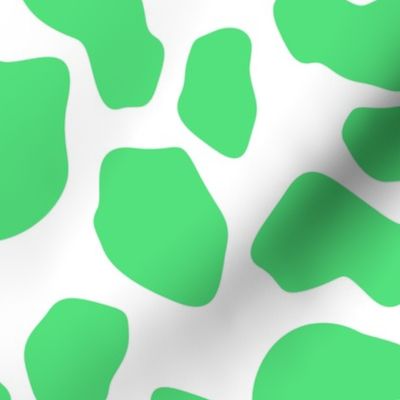 green and white cow spots