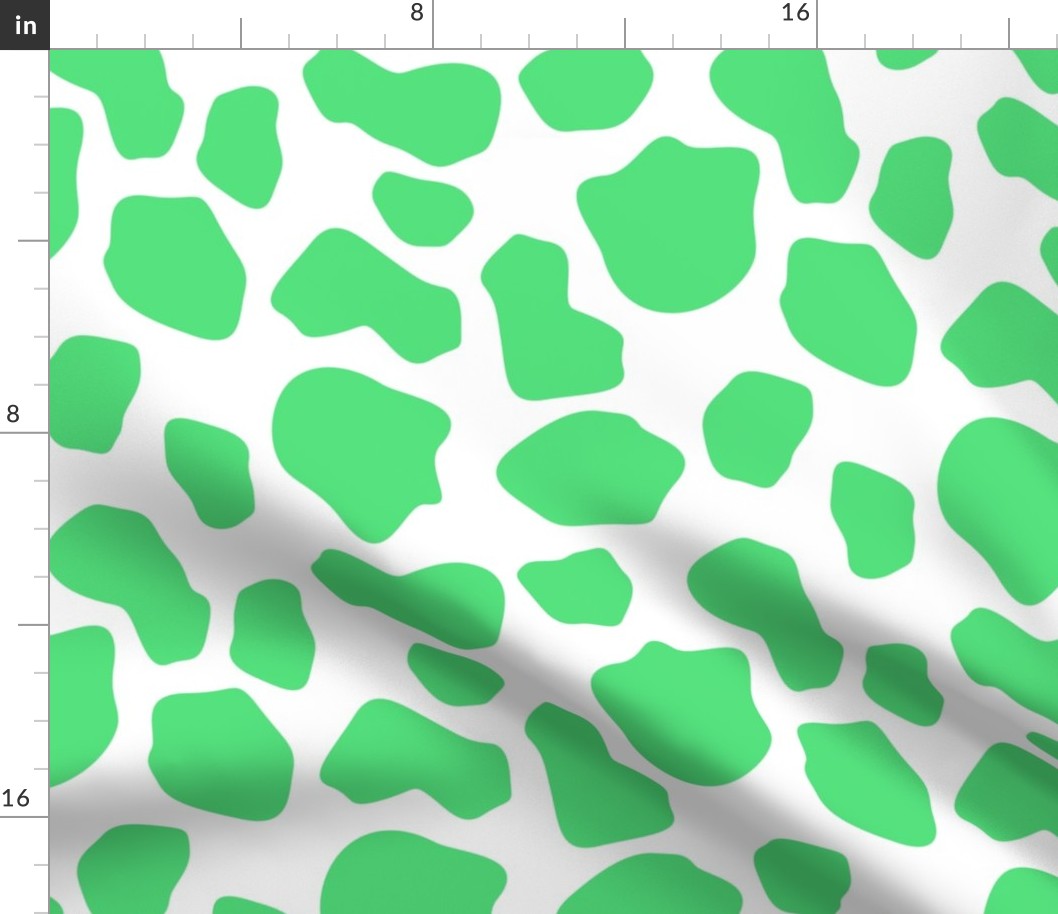 green and white cow spots