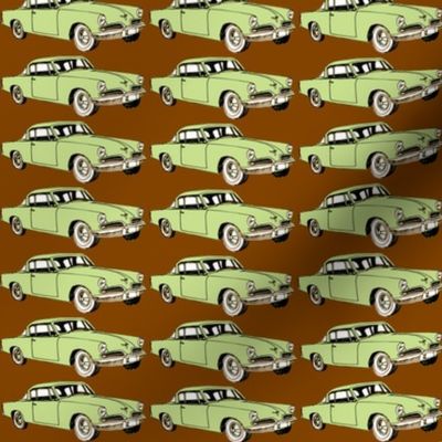 Green 1953 Studebaker Starliner on cocoa background (straight rows)