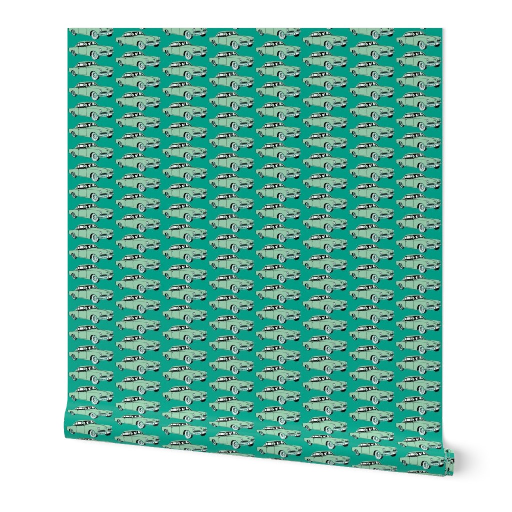 Big aqua 1953 Studebaker on teal background