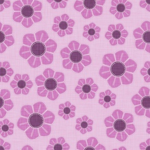 Stylized purple flowers on pink gingham, with a hand-stitched look.