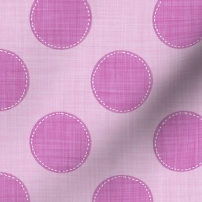 Magenta polka dots with stitch-like details on a pink fabric texture.