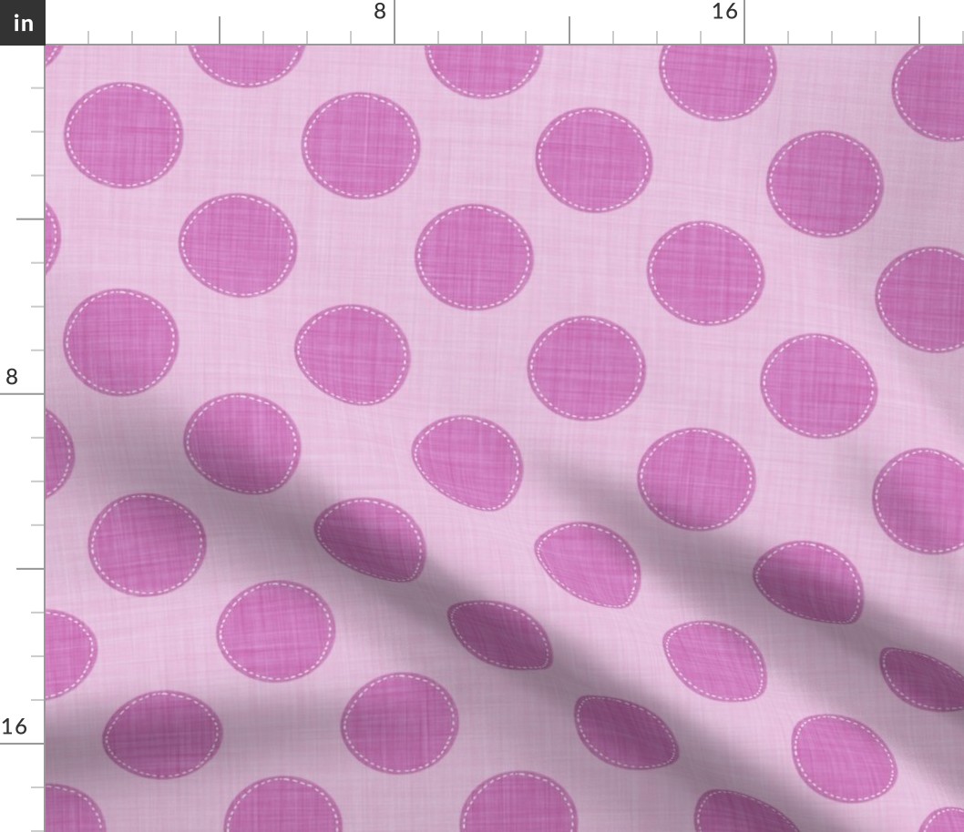 Magenta polka dots with stitch-like details on a pink fabric texture.
