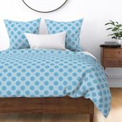 Whimsical dotted blue circles on a linen-styled background.