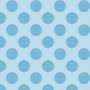 Whimsical dotted blue circles on a linen-styled background.