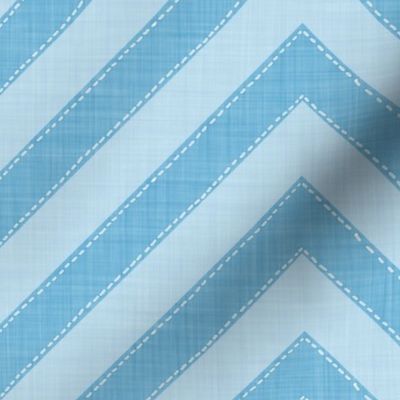 Dynamic blue chevron pattern with a playful, structured energy.