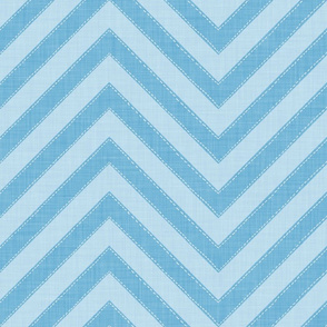 Dynamic blue chevron pattern with a playful, structured energy.