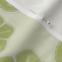 Artisanal olive green flowers on pale green for a lively, handcrafted motif.