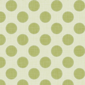 Olive dots with a hand-stitched look on light green create a playful, artisanal vibe.