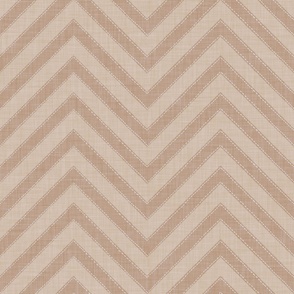 Beige chevrons with dotted outlines on cream offer a calm, handcrafted look.