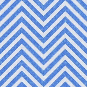 Blue and white chevron pattern with a textured, nautical feel.