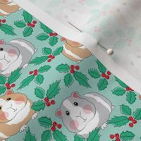 small guinea pigs with holly on teal