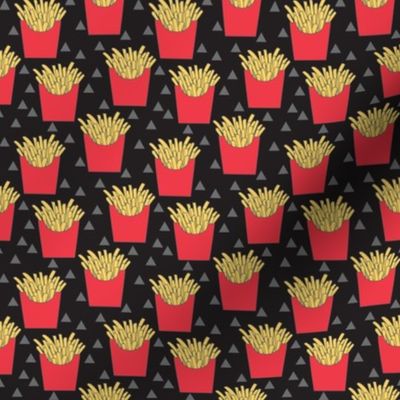 tiny french fries with red box on black