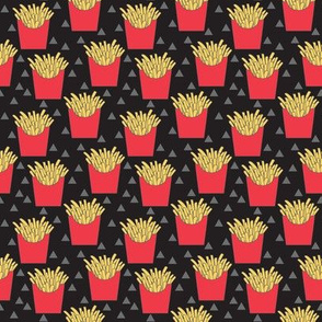 tiny french fries with red box on black