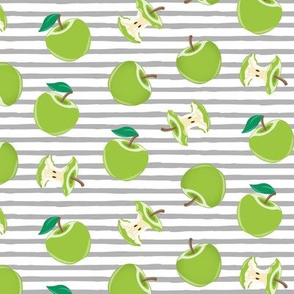 green apples and apple cores on stripes - LAD20
