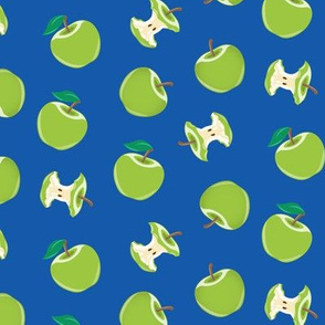 green apples and apple cores on blue 2 - LAD20