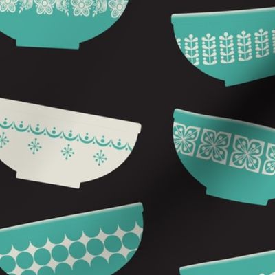 aqua pyrex bowls - black background