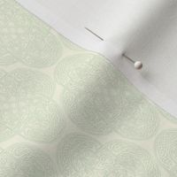 Celtic Rococo in cream on green