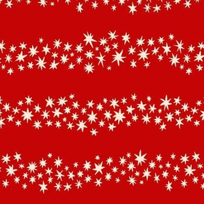 Festive messy christmas stars on bright red