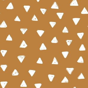 small sketch triangles on mustard yellow