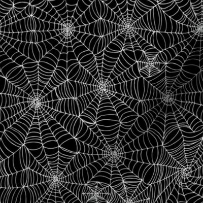 Spiderwebs -   White on black, small scale