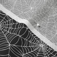 Spiderwebs -   White on black, small scale