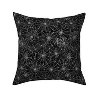 Spiderwebs -   White on black, small scale