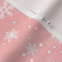 Christmas winter snowflakes on light pink