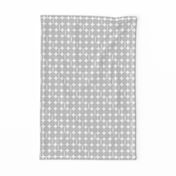 "Core" Small geometric, light gray polkadots on white.