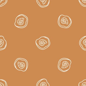 Seamless background ammonite fossil gender neutral baby pattern.