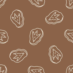 Seamless background dinosaur foot track fossil gender neutral baby pattern.