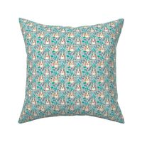 tiny reindeer guinea pigs with winter foliage on soft blue
