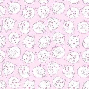 Cute doodle cats muzzles on pink