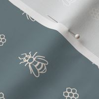 Seamless background bee and honeycomb gender neutral baby pattern.