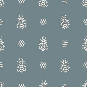 Seamless background bee and honeycomb gender neutral baby pattern.