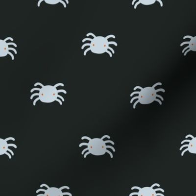 Small spiders with dark background