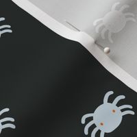 Small spiders with dark background