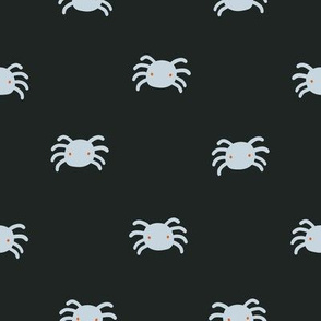 Small spiders with dark background