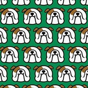 English Bulldog faces on green