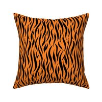 Tiger stripes in orange and black animal print