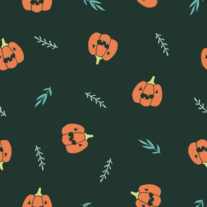 Cute Halloween pumpkins and plant branches