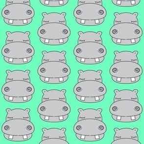 hippo faces on bright green