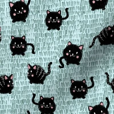 Fluffy Kittens - cute little cats on light blue / turquoise background