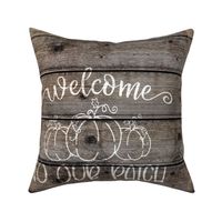 Welcome to our Patch Pumpkin 18 inch square on dark wood