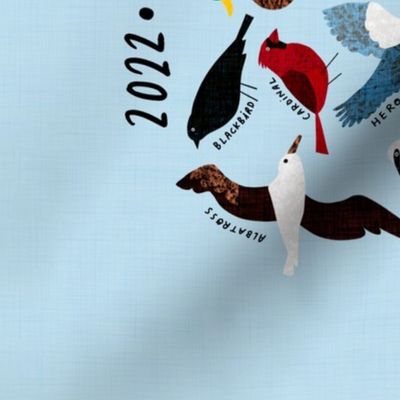 An Alphabet of Birds 2022 Calendar Tea Towel in sky blue