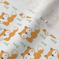 tiny foxes on white with green trees