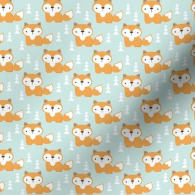 tiny foxes on soft turquoise