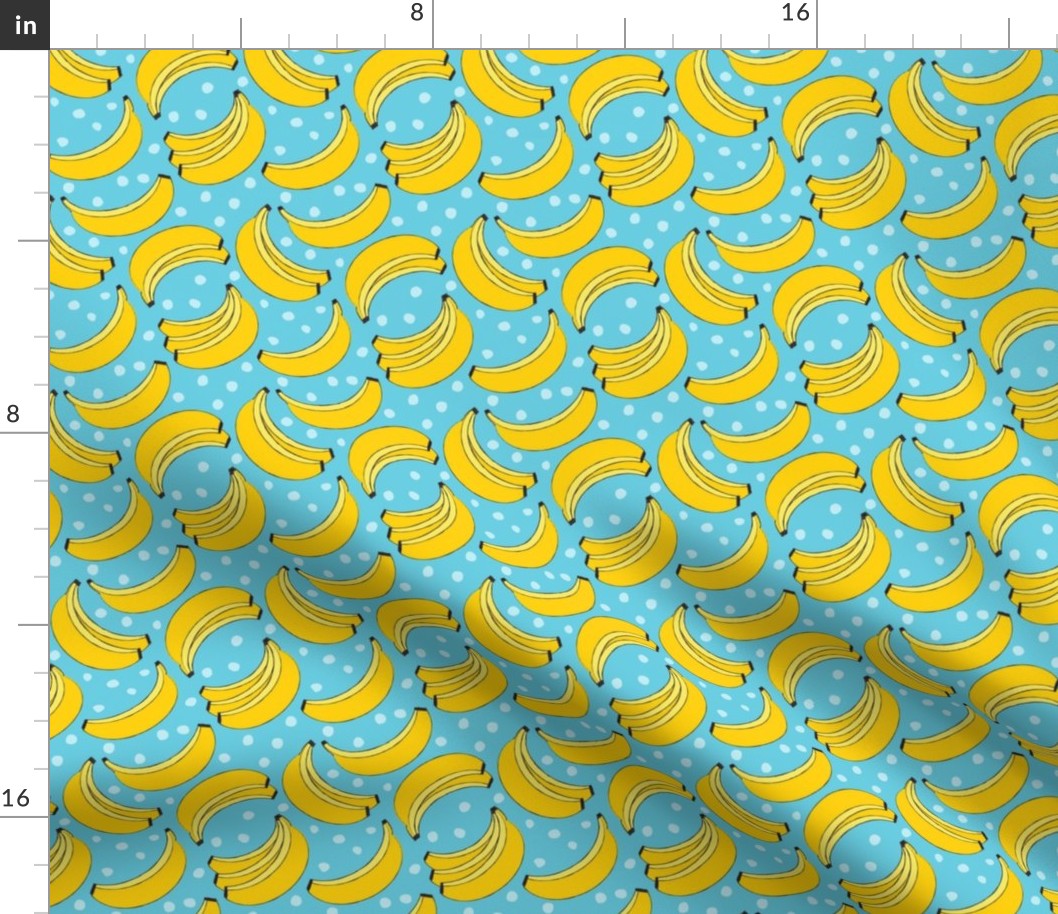 geometric bananas and dots on blue