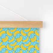 tiny geometric bananas on blue