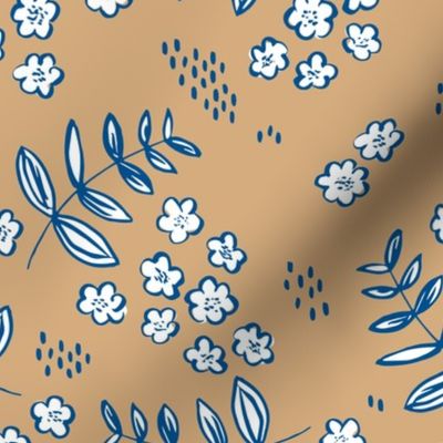 Blue cold winter garden leaves and flowers boho nursery baby caramel brown